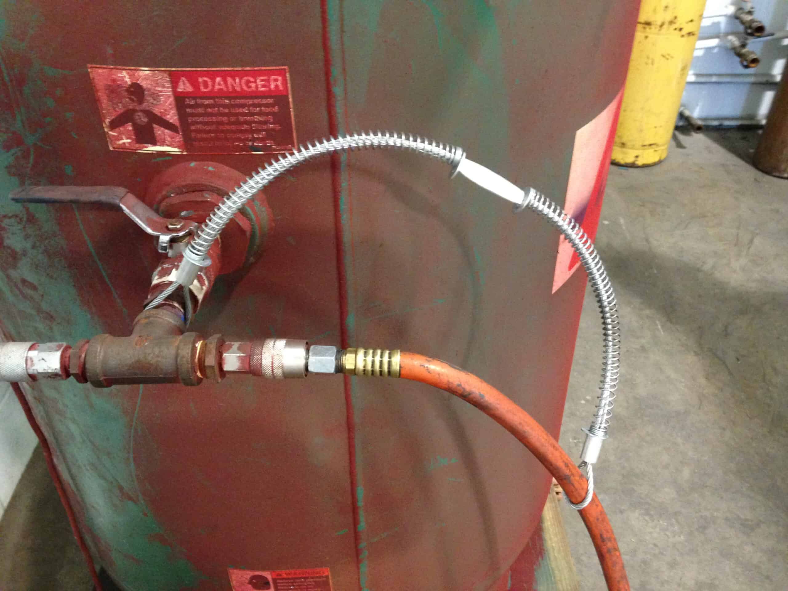 American Iron Works Whip Check Hose to tool